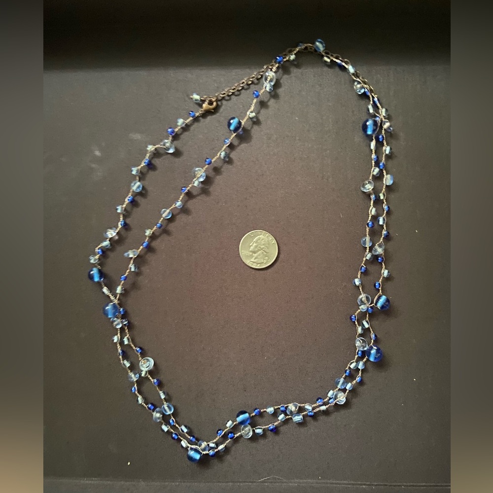 Long blue beaded necklace